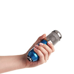 Woman with microphone on white background, closeup