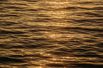 Sunlight Sparkling off a Calm Ocean at Sunset