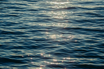 Sunlight Sparkling off a Calm Ocean at Sunset