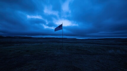 American Flag Waves Under a Dark Blue Sky
