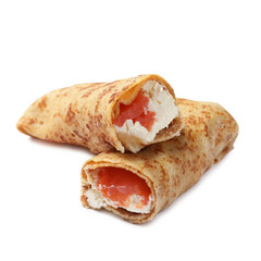 Delicious crepes with salmon and cream cheese isolated on white