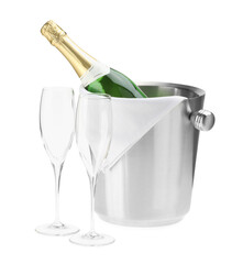 Bottle of champagne in ice bucket and empty glasses isolated on white