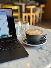 cup of coffee and laptop