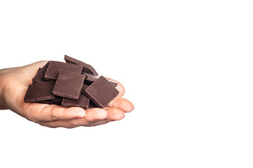 slices of delicious dark chocolate on a light background.