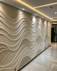 Obraz premium A modern interior wall featuring elegant wave patterns and soft lighting, creating a stylish and sophisticated ambiance.