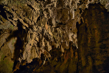 Cave interior with visible effects of karst processes like stalagmite and stalactite