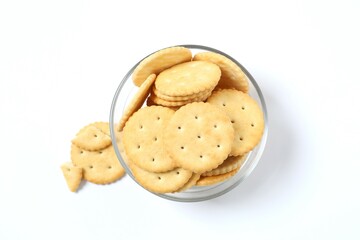 Delicious crispy crackers cookies in a plate on white background 