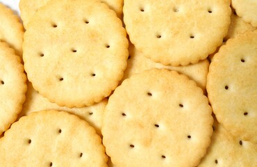Delicious crispy crackers cookies as a background 