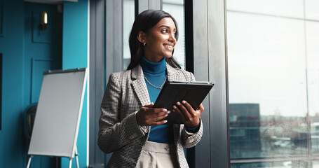 Thinking, tablet and smile with business woman in office for workshop coordinator, reflection and...