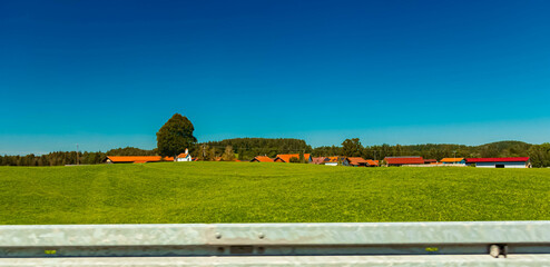 Fototapeta premium Alpine summer view with a church near Butzau, Steingaden, Weilheim-Schongau, Ostallgaeu, Bavaria, Germany