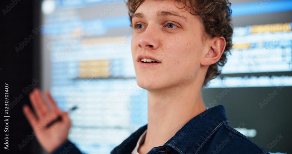 Leinwandbilder Programming lecture, student and man in college for learning, education or teaching ai course. University, class and study coding with data for software development in digital presentation on screen