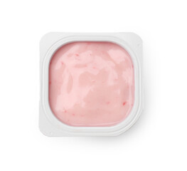Delicious yogurt in plastic cup isolated on white, top view