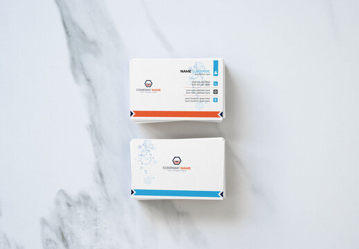 Minimalist Pink Business Cards Stacked on a Marble Surface. Fornt and back design
