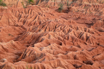 the Tatacoa Desert in Colombia, Huila, showcasing its arid landscape, eroded canyons, unique rock formations, and vibrant skies. Perfect for nature, travel, and adventure themes.
