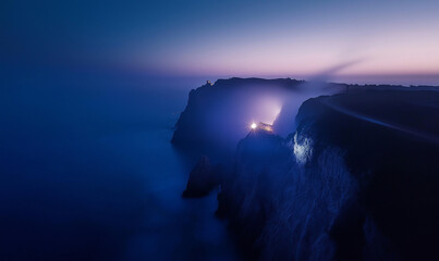 Aerial Drone Light Show Over a Scenic Cliff, Creating a Magical and Mesmerizing Nighttime Display