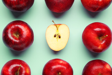 Fresh ripe red apples on light blue background, flat lay