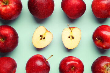 Fresh ripe red apples on light blue background, flat lay