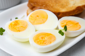 Hard boiled eggs on light table, closeup