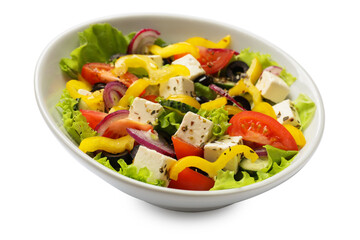Delicious fresh Greek salad in bowl on white background