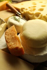 Different types of cheese on table, closeup