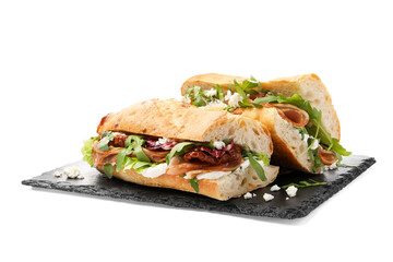 Halves of baguette sandwich with prosciutto and sun dried tomatoes isolated on white
