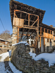 Fototapeta premium Winter Sunset view of Village of Kovachevitsa, Bulgaria