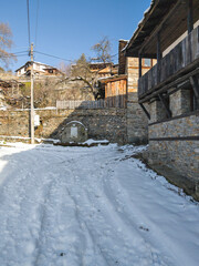 Obraz premium Winter Sunset view of Village of Kovachevitsa, Bulgaria