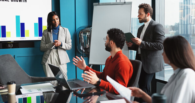 Data, presentation and business woman with group in meeting, question and profit growth discussion. Finance, team and brainstorming in office, training and company operations manager with metrics