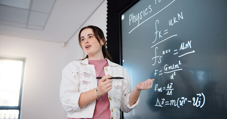 Education, woman and student by board in lecture explaining science equation to class at college. Revision, writing and female person with physics research for university exam, test or assignment.