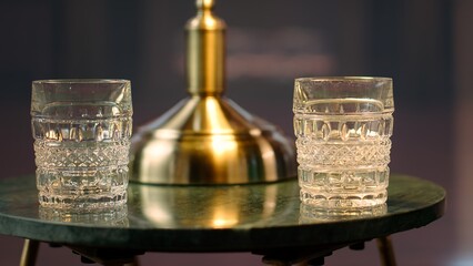 Timeless refined library at the elite social club with green chairs and whiskey glasses, elegant...