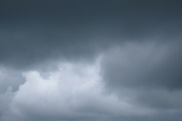 Dark blue cloudy abstract texture background.Copy space for text.Climate and weather concept.Natural patterns,shapes and tectures.For graphic design or banner background