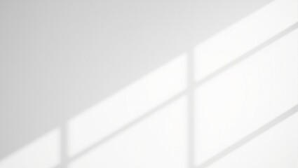 Fototapeta premium Sharp triangular shadow on pale white wall with soft gradients Clean geometry and light play emphasized