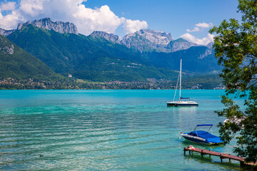 sailing on the turquoise blue waters of Lake Annecy