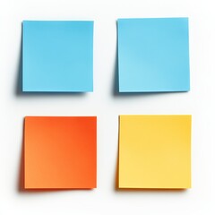 Four blank colorful sticky notes arranged in a grid on a white background.