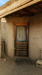 Rustic Adobe Doorway in a Traditional Mud-Brick House