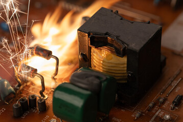 Electronic Circuit Board with Sparks and Flames