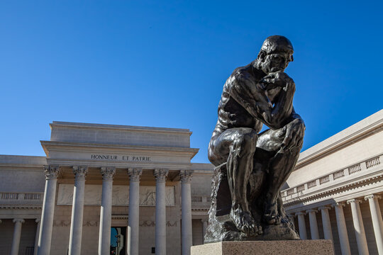 The Thinker sculpture by Rodin at the Legion of Honor in San Francisco, prominently displayed in front of the museum's classical architecture, highlighting its cultural and historical significance.