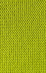 Vertical lemon coloured knitted texture as a backdrop.
