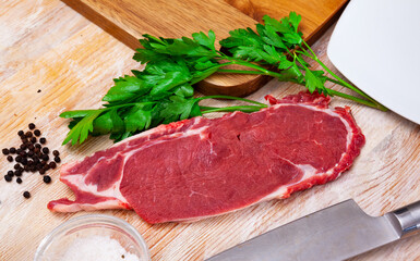 Piece of beef with peas of bitter pepper and parsley