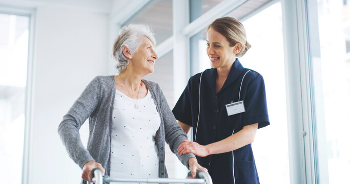 Physical therapy, support and woman with walker, healthcare or balance for rehabilitation in clinic. Smile, physiotherapist and help for senior person with disability, happy and kindness in hospital - Powered by Adobe