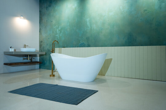 bathtub in bathroom with blue Background