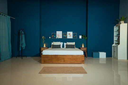 bed in asthetic ambience with blue background