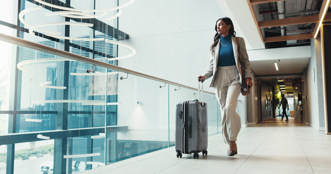 Business, woman or suitcase in airport for travel, departure or thinking of flight schedule. Professional, company representative or bag in lobby for international trip, global opportunity or retreat - Powered by Adobe