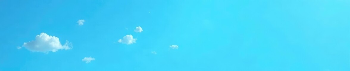 A scattering of tiny white clouds against a bright blue background, atmosphere, serene, dots