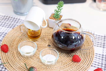 Cake Ingredients Glass jars of oatmeal and yellow honey,Dripping honey,Tea