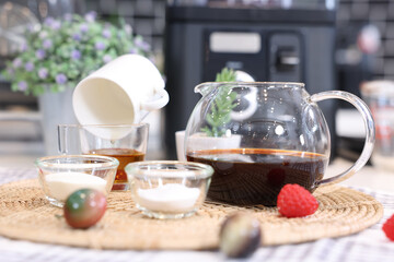 Cake Ingredients Glass jars of oatmeal and yellow honey,Dripping honey,Tea
