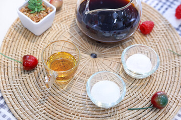 Cake Ingredients Glass jars of oatmeal and yellow honey,Dripping honey,Tea