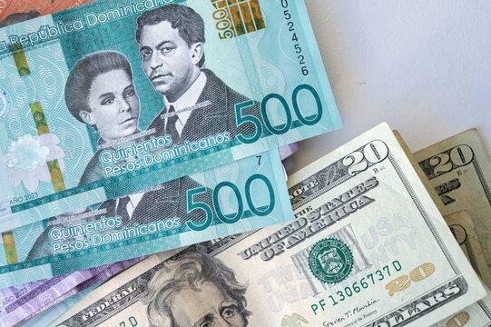 close-up of banknotes of Dominican pesos and North American dollars