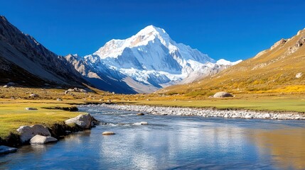 Majestic snow-capped mountains rise above a serene flowing river valley