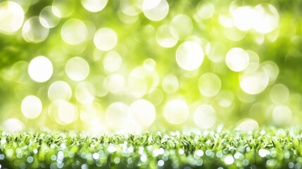Obraz premium Green bokeh background with grass in foreground